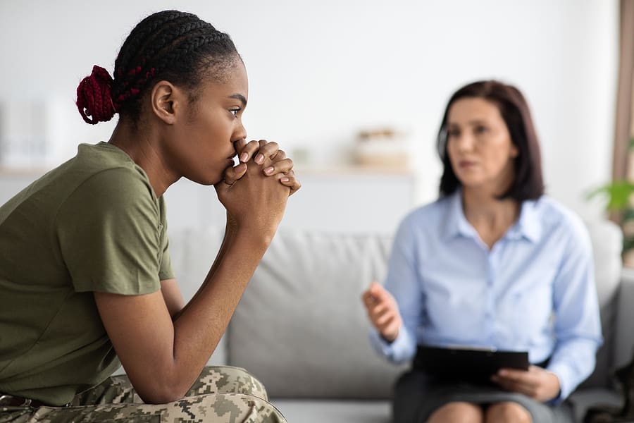 Female veteran talks about her experience with military sexual trauma to a therapist