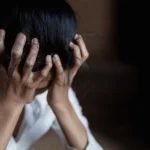 Female veteran struggling with anxiety and depression