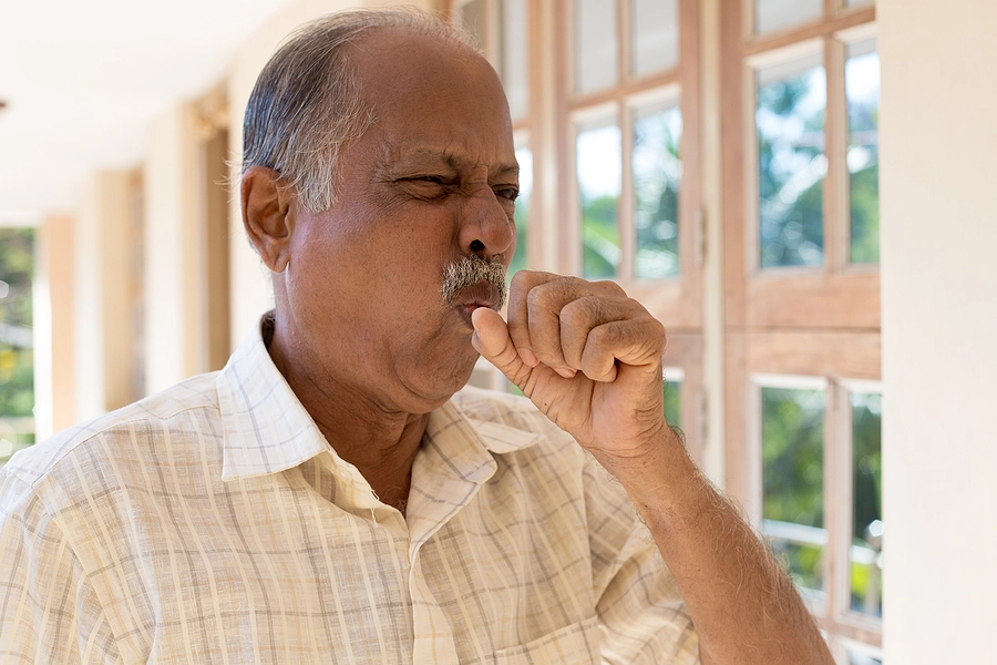 older male veteran with reactive airway disease coughing