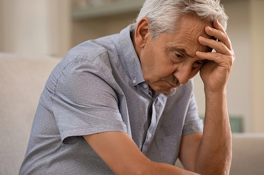 older male veteran suffering from depression related to military service